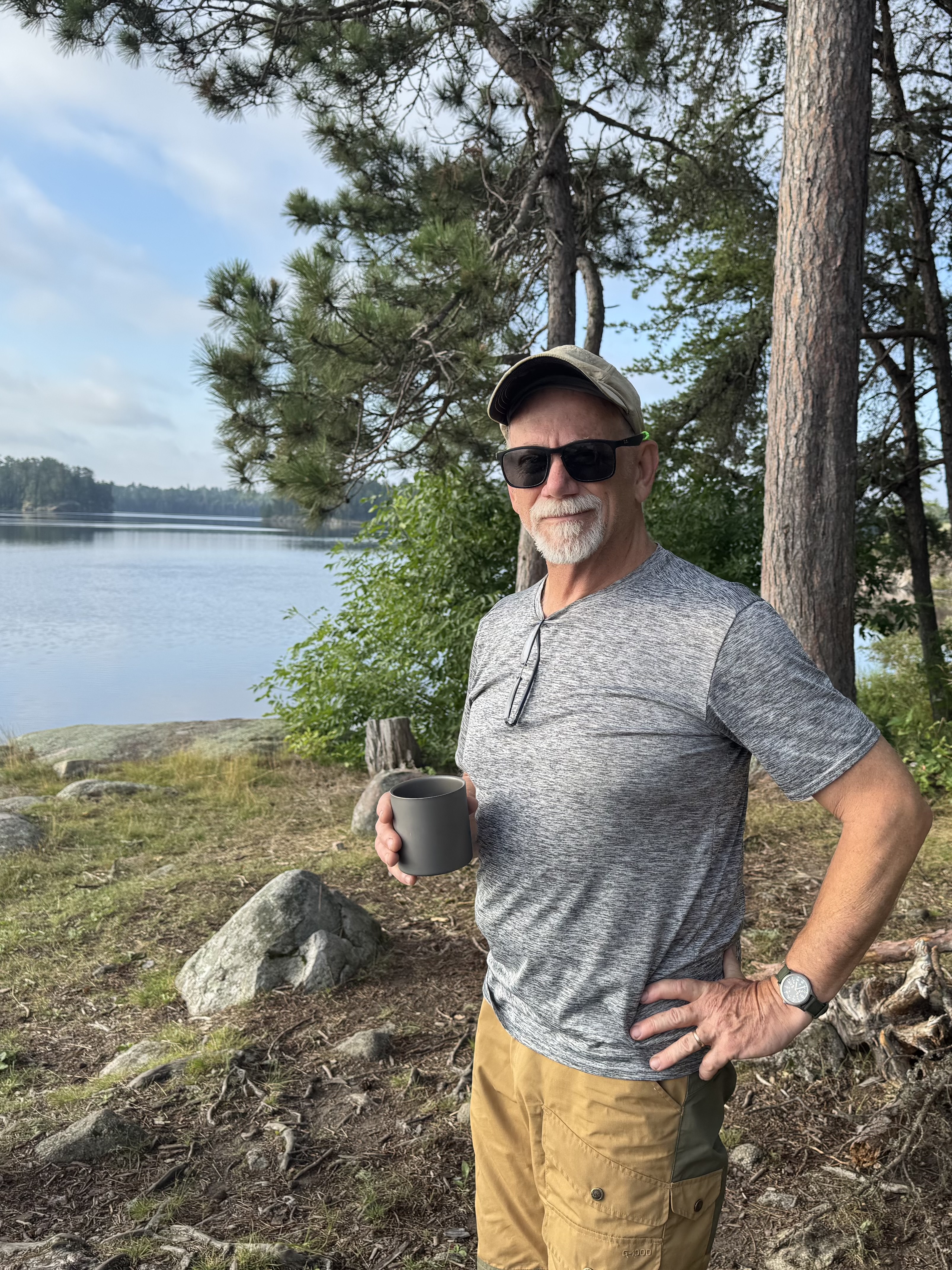 Royce having coffee. Crooked Lake north of Saturday Bay 2025-08-07 07:51