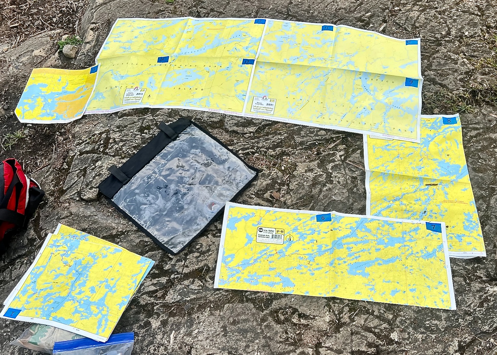 Puzzling over maps before leaving Ottertrack camp 2025-08-11 08:30