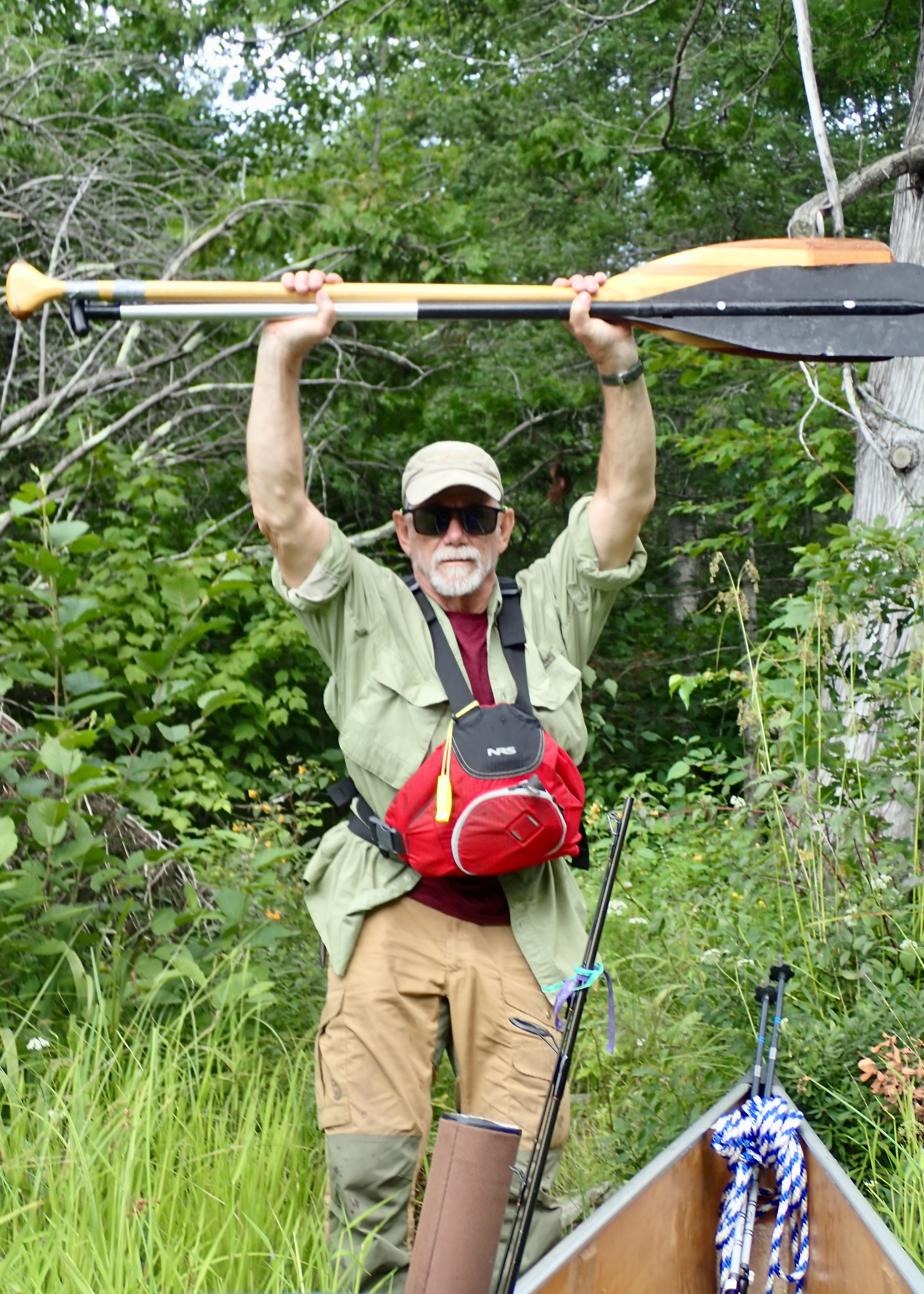 Royce showing that he has two paddles - Ottertrack to Jasper Lake portage 2025-08-11 11:16