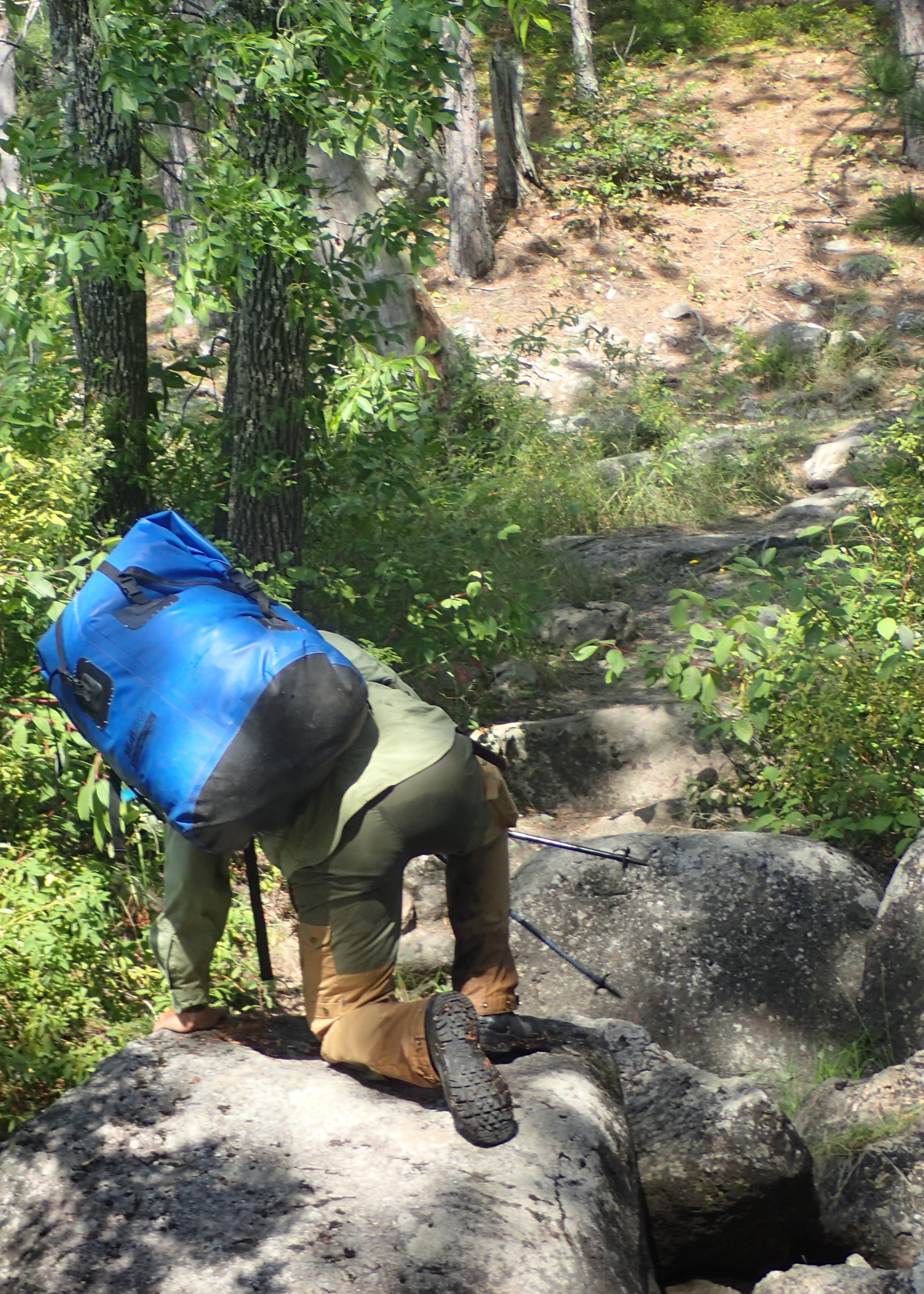 Royce bounding over boulders on the Split Rock (Keats to Chatterton) portage 2025-08-15 13:22
