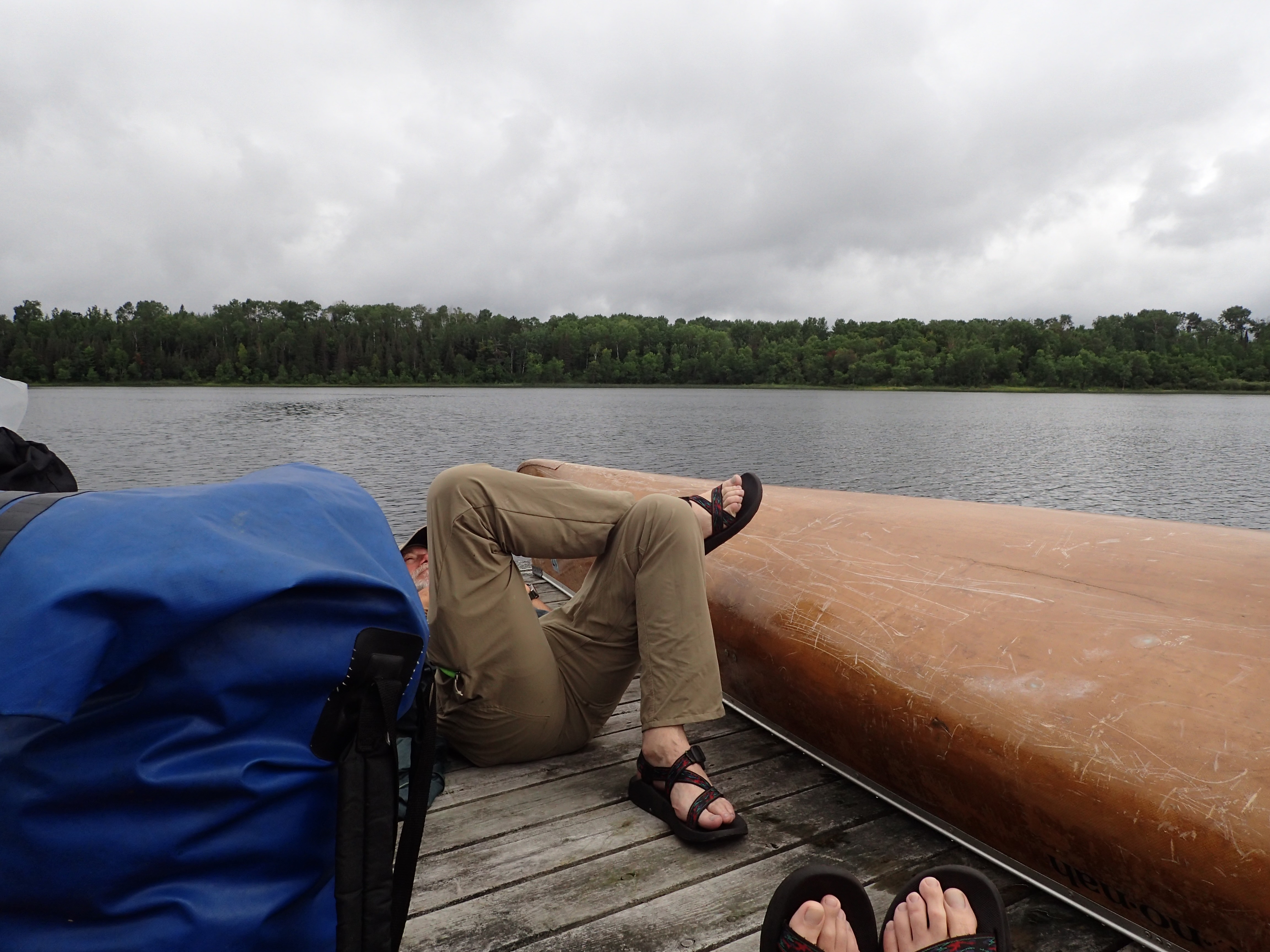 Sitting on a dock off Bell Island on Lac la Croix 2025-08-19 10:30